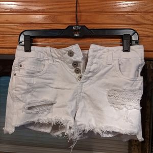 White destressed jean shorts
